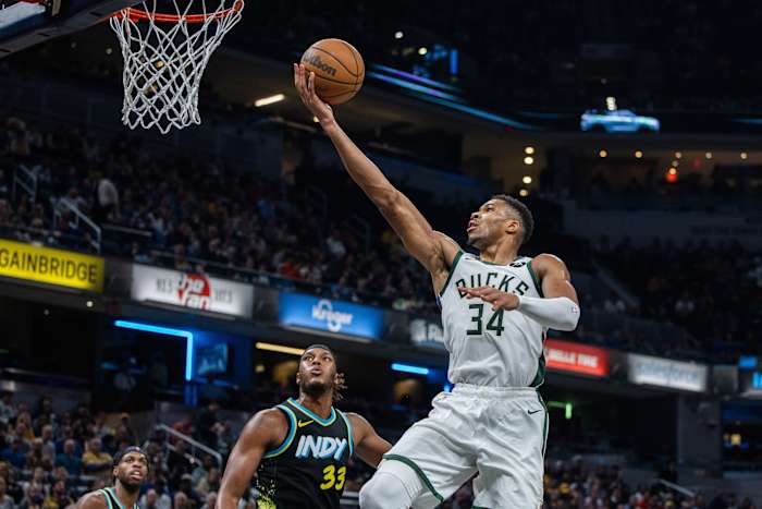 Milwaukee Bucks forward Giannis Antetokounmpo (34) shoots the ball while Indiana Pacers center Myles Turner (33)